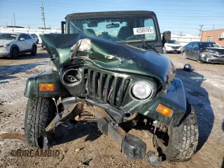 1997 Jeep Wrangler Sahara with VIN 1J4FY49S2VP542031, listed as a Copart auction lot 42509765 with 136,689 mi miles and Salvage Title. Bid and sale history available at carsss.com. Image 5.