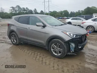 2017 Hyundai Santa Fe 2.4L z VIN 5NMZT3LBXHH038022, wystawiony jako Copart lot #51060545 z przebiegiem 63 790 mil mil oraz Szkoda całkowita • Salvage title. Historia ofert i sprzedaży dostępna na DreamBid. Obrazek 4.