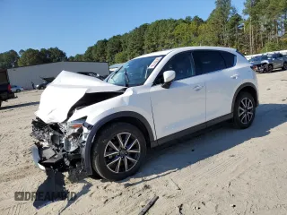 2018 Mazda CX-5 Grand Touring with VIN JM3KFADM9J1439436, listed as a Copart auction lot 74189114 with 0 mi miles and Salvage Title. Bid and sale history available at carsss.com. Image 1.