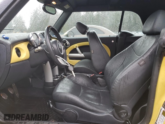 2005 MINI Convertible S with VIN WMWRH33475TF81762, listed as a Copart auction lot 46510115 with 139,199 mi miles and Salvage title. Bid and sale history available at DreamBid. Image 7.