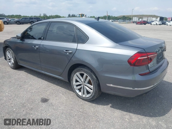 2019 Volkswagen Passat 2.0T Wolfsburg Edition with VIN 1VWLA7A35KC011084, listed as a IAAI auction lot 40385111 with 81,119 mi miles. Bid and sale history available at carsss.com. Image 3.