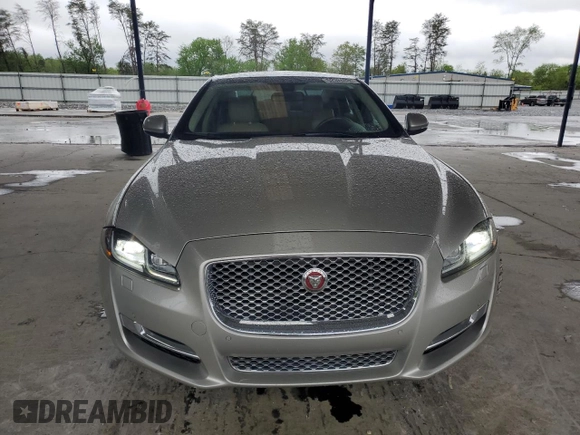 2016 Jaguar XJ Portfolio with VIN SAJWA2G70G8V93006, listed as a Copart auction lot 52324635 with 123,690 mi miles and Salvage Title. Bid and sale history available at DreamBid. Image 5.