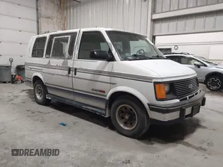 1994 Chevrolet Astro Cargo z VIN 1GBDM19Z0RB167297, wystawiony jako IAAI lot #42305621 z przebiegiem 154 683 mil mil oraz . Historia ofert i sprzedaży dostępna na DreamBid. Obrazek 1.