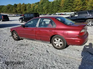 1996 Honda Accord EX with VIN 1HGCD5667TA021809, listed as a Copart auction lot 69371974 with 409,852 mi miles and Salvage Title. Bid and sale history available at carsss.com. Image 2.