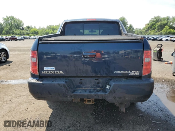 2010 Honda Ridgeline RTL with VIN 5FPYK1F5XAB004153, listed as a Copart auction lot 59710535 with Not provided miles and Salvage title. Bid and sale history available at DreamBid. Image 6.