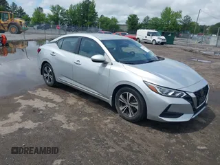 2021 Nissan Sentra SV z VIN 3N1AB8CV5MY299245, wystawiony jako IAAI lot #42180004 z przebiegiem 25 856 mil mil oraz . Historia ofert i sprzedaży dostępna na DreamBid. Obrazek 1.