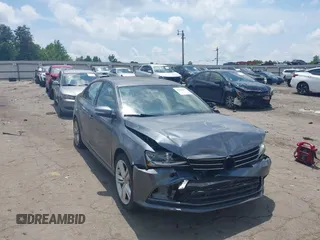 2014 Volkswagen Jetta SE with VIN 3VWD07AJ3EM232529, listed as a IAAI auction lot 42286442 with 125,000 mi miles and . Bid and sale history available at DreamBid. Image 1.