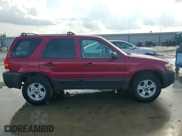2006 Ford Escape XLT with VIN 1FMYU03196KA38458, listed as a Copart auction lot 64194705 with 102,097 mi miles and Salvage title. Bid and sale history available at DreamBid. Image 13.