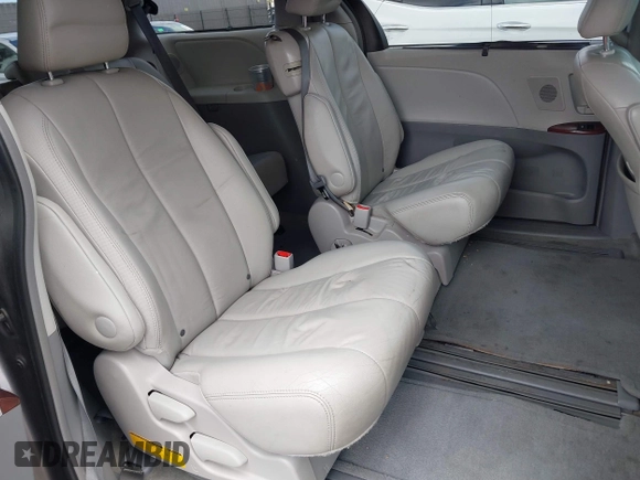 2014 Toyota Sienna XLE with VIN 5TDYK3DC7ES517206, listed as a IAAI auction lot 41945572 with 128,743 mi miles and . Bid and sale history available at DreamBid. Image 8.