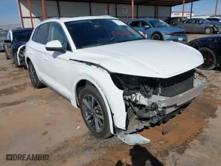 2021 Audi Q5 Premium Plus with VIN WA1BAAFYXM2125942, listed as a IAAI auction lot 41671026 with 63,804 mi miles. Bid and sale history available at carsss.com. Image 1.