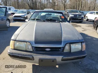 1993 Ford Mustang с VIN 1FACP41M6PF186870, выставлен на аукционе Copart как лот 87487744 с пробегом 37 671 миль миль и Списание • Salvage title. История ставок и продаж доступна на DreamBid. Изображение 5.