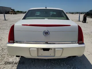 2006 Cadillac DTS 1SB z VIN 1G6KD57Y86U126164, wystawiony jako Copart lot #52686965 z przebiegiem 153 426 mil mil oraz Szkoda całkowita • Salvage title. Historia ofert i sprzedaży dostępna na DreamBid. Obrazek 6.