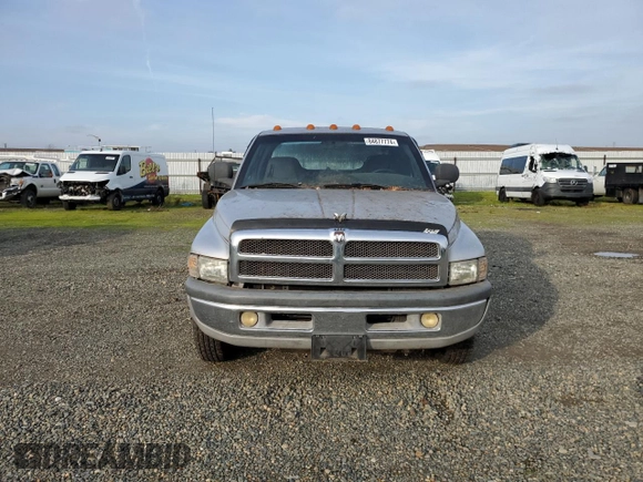 2001 Dodge 3500 z VIN 1B7MC33W71J574245, wystawiony jako Copart lot #84877774 z przebiegiem 200 945 mil mil oraz Szkoda całkowita • Salvage title. Historia ofert i sprzedaży dostępna na DreamBid. Obrazek 5.