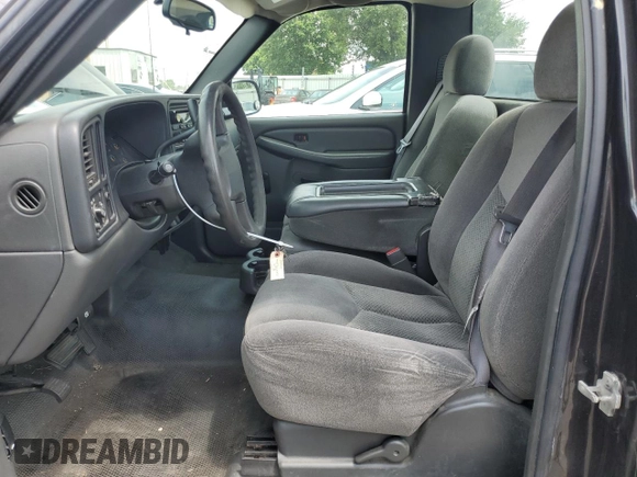 2005 Chevrolet Silverado 1500 Work Truck with VIN 1GCEC14XX5Z204219, listed as a Copart auction lot 60194575 with 198,381 mi miles and Salvage title. Bid and sale history available at DreamBid. Image 7.