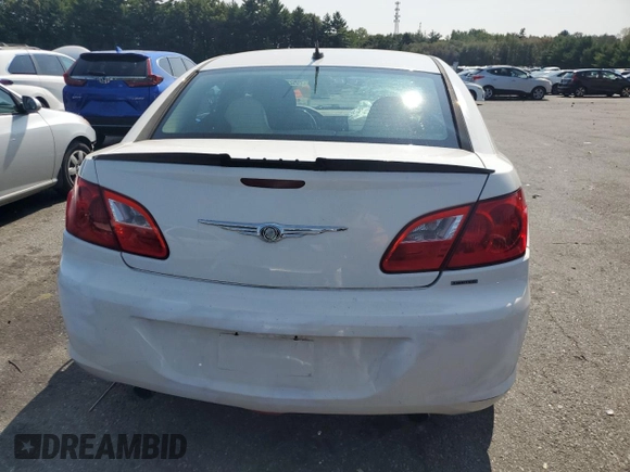 2009 Chrysler Sebring Limited with VIN 1C3LC56V39N566582, listed as a Copart auction lot 70522454 with 148,113 mi miles and Salvage title. Bid and sale history available at DreamBid. Image 6.