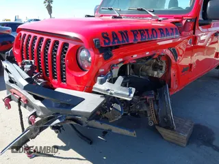 2022 Jeep Gladiator Willys Sport z VIN 1C6HJTAG0NL180848, wystawiony jako IAAI lot #41778129 z przebiegiem Nie podano mil oraz . Historia ofert i sprzedaży dostępna na DreamBid. Obrazek 6.
