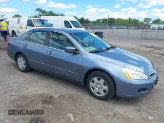 2007 Honda Accord LX with VIN 1HGCM56497A008600, listed as a IAAI auction lot 42521291 with 77,976 mi miles and . Bid and sale history available at DreamBid. Image 1.