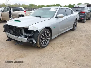 2021 Dodge Charger R/T with VIN 2C3CDXCT7MH652202, listed as a IAAI auction lot 42059667 with 52,244 mi miles and . Bid and sale history available at carsss.com. Image 2.