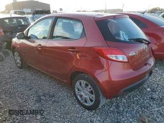 2014 Mazda 2 Sport with VIN JM1DE1KZ5E0186789, listed as a Copart auction lot 70519794 with 106,127 mi miles and Salvage Title. Bid and sale history available at carsss.com. Image 2.