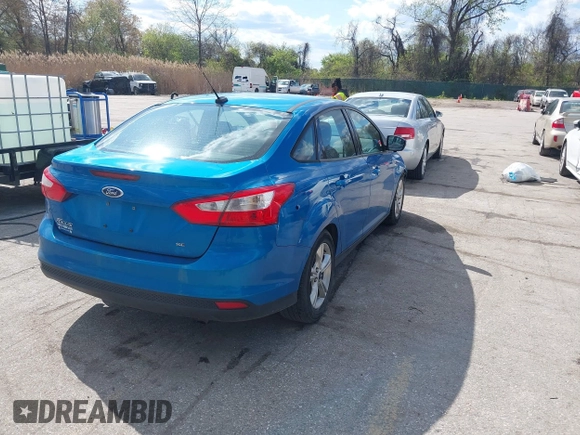 2014 Ford Focus SE with VIN 1FADP3F29EL160431, listed as a IAAI auction lot 42037212 with 112,607 mi miles. Bid and sale history available at carsss.com. Image 4.