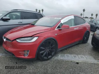2018 Tesla Model X 75D with VIN 5YJXCAE2XJF115410, listed as a Copart auction lot 44020565 with 50,663 mi miles and Salvage Title. Bid and sale history available at carsss.com. Image 1.