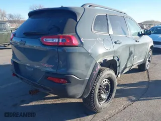 2015 Jeep Cherokee Trailhawk with VIN 1C4PJMBB5FW540094, listed as a IAAI auction lot 41440568 with 191,852 mi miles. Bid and sale history available at carsss.com. Image 4.