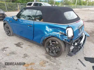 2022 MINI Convertible Cooper S z VIN WMW43DL06N3P19784, wystawiony jako IAAI lot #42635816 z przebiegiem 17 053 mil mil oraz . Historia ofert i sprzedaży dostępna na DreamBid. Obrazek 3.