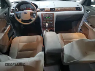 2005 Ford Five Hundred SEL with VIN 1FAFP24195G194679, listed as a Copart auction lot 79450804 with 98,954 mi miles and Salvage Title. Bid and sale history available at carsss.com. Image 8.