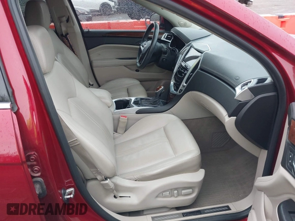 2013 Cadillac SRX Premium Collection with VIN 3GYFNEE3XDS604238, listed as a IAAI auction lot 41949780 with 71,563 mi miles and . Bid and sale history available at DreamBid. Image 5.