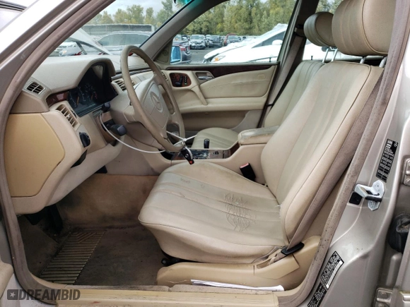 1998 Mercedes-Benz E-Class with VIN WDBJH82F7WX010567, listed as a Copart auction lot 79104764 with NaN miles and Clean Title. Bid and sale history available at carsss.com. Image 7.