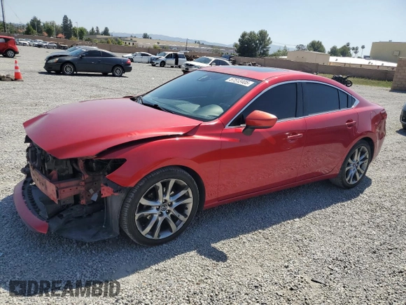 2014 Mazda 6 i Grand Touring с VIN JM1GJ1W64E1121399, выставлен на аукционе Copart как лот 57513405 с пробегом 161 286 миль миль и Списание • Salvage title. История ставок и продаж доступна на DreamBid. Изображение 1.