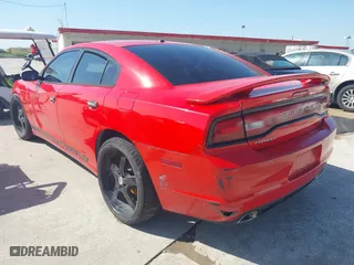 2014 Dodge Charger RT Plus with VIN 2C3CDXCT2EH315597, listed as a IAAI auction lot 41974446 with 166,928 mi miles. Bid and sale history available at carsss.com. Image 3.
