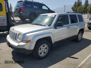 2014 Jeep Patriot Sport with VIN 1C4NJPBB1ED512442, listed as a Copart auction lot 61415565 with 211,715 mi miles and Salvage title. Bid and sale history available at DreamBid. Image 1.