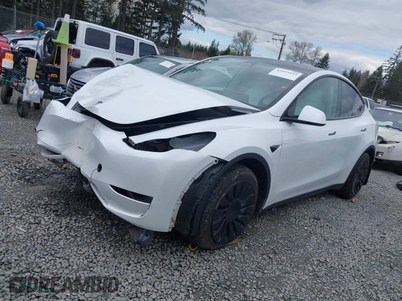 2023 Tesla Model Y Long Range z VIN 7SAYGAEEXPF647352, wystawiony jako IAAI lot #41955933 z przebiegiem Nie podano mil oraz . Historia ofert i sprzedaży dostępna na DreamBid. Obrazek 20.