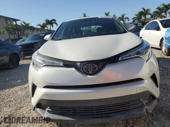 2019 Toyota C-HR XLE z VIN JTNKHMBX7K1014151, wystawiony jako Copart lot #50699475 z przebiegiem 102 995 mil mil oraz Czysty tytuł • Clean title. Historia ofert i sprzedaży dostępna na DreamBid. Obrazek 5.