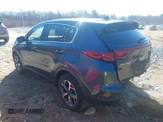 2020 Kia Sportage LX with VIN KNDPM3AC2L7656080, listed as a IAAI auction lot 41880254 with 34,023 mi miles and . Bid and sale history available at DreamBid. Image 3.