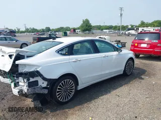 2018 Ford Fusion Titanium with VIN 3FA6P0D97JR247621, listed as a IAAI auction lot 42465608 with 174,983 mi miles and . Bid and sale history available at DreamBid. Image 4.