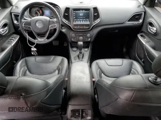 2021 Jeep Cherokee Latitude Lux z VIN 1C4PJMMX8MD166792, wystawiony jako Copart lot #62931925 z przebiegiem 21 669 mil mil oraz Szkoda całkowita • Salvage title. Historia ofert i sprzedaży dostępna na DreamBid. Obrazek 8.