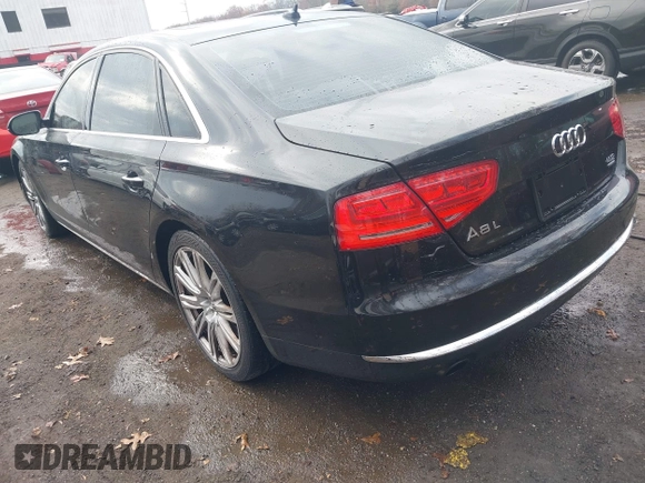 2012 Audi A8 L with VIN WAURVAFD8CN006917, listed as a IAAI auction lot 40877090 with 144,387 mi miles. Bid and sale history available at carsss.com. Image 3.