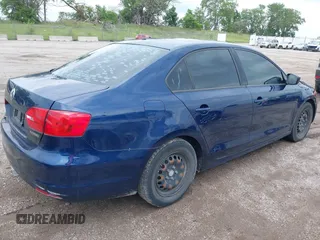 2014 Volkswagen Jetta S with VIN 3VW2K7AJ2EM438149, listed as a IAAI auction lot 42594264 with 54,675 mi miles and . Bid and sale history available at DreamBid. Image 4.