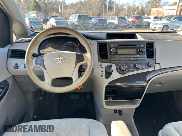 2014 Toyota Sienna L with VIN 5TDZK3DC7ES448022, listed as a Copart auction lot 52548605 with 202,484 mi miles and Clean Title. Bid and sale history available at carsss.com. Image 9.