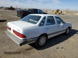 1986 Ford Tempo z VIN 1FABP22X4GK263512, wystawiony jako Copart lot #50618855 z przebiegiem 392 265 mil mil oraz Tytuł czysty. Historia ofert i sprzedaży dostępna na DreamBid. Obrazek 3.