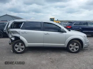 2013 Dodge Journey SE with VIN 3C4PDCAB9DT532554, listed as a IAAI auction lot 42026129 with 164,599 mi miles. Bid and sale history available at carsss.com. Image 14.