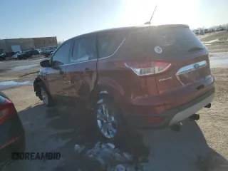 2013 Ford Escape SEL with VIN 1FMCU9H9XDUA48561, listed as a Copart auction lot 47809485 with 310,598 mi miles and Salvage Title. Bid and sale history available at DreamBid. Image 2.
