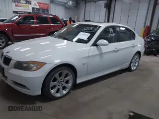 2006 BMW 3 Series 330xi with VIN WBAVD33546KL51295, listed as a IAAI auction lot 41742575 with 164,434 mi miles. Bid and sale history available at carsss.com. Image 2.