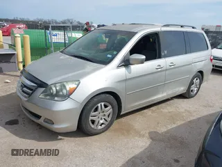 2005 Honda Odyssey EX with VIN 5FNRL38415B039809, listed as a IAAI auction lot 41884459 with 231,258 mi miles. Bid and sale history available at carsss.com. Image 2.
