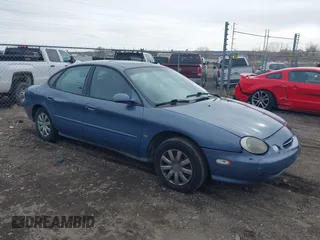 1999 Ford Taurus SE with VIN 1FAFP53S8XA278221, listed as a IAAI auction lot 41820964 with 115,109 mi miles. Bid and sale history available at carsss.com. Image 1.