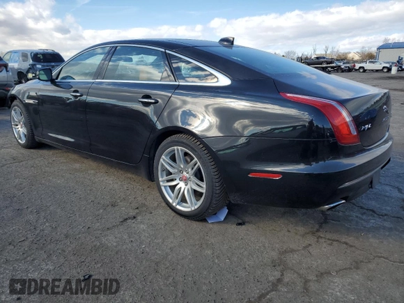 2017 Jaguar XJ with VIN SAJWJ2GD0H8W07154, listed as a Copart auction lot 42090375 with 66,546 mi miles and Salvage Title. Bid and sale history available at carsss.com. Image 2.