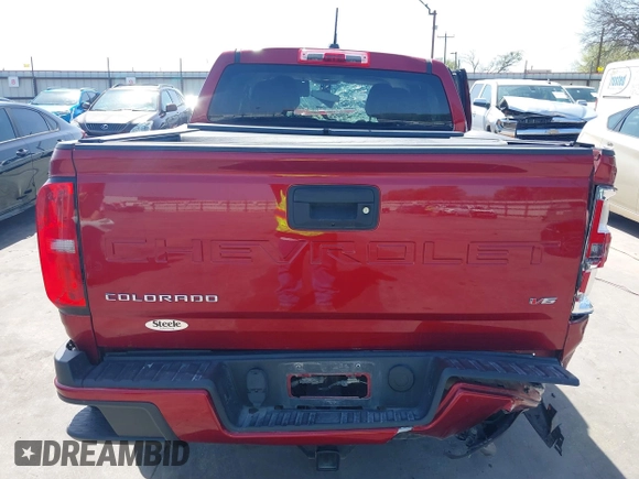 2021 Chevrolet Colorado 2WD Work Truck with VIN 1GCGSBEN1M1101105, listed as a IAAI auction lot 41827728 with 75,064 mi miles and . Bid and sale history available at DreamBid. Image 16.