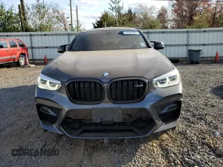 2020 BMW X4 M Competition z VIN 5YMUJ0C05L9B57303, wystawiony jako Copart lot #79167294 z przebiegiem 56 584 mil mil oraz Szkoda całkowita • Salvage title. Historia ofert i sprzedaży dostępna na DreamBid. Obrazek 5.